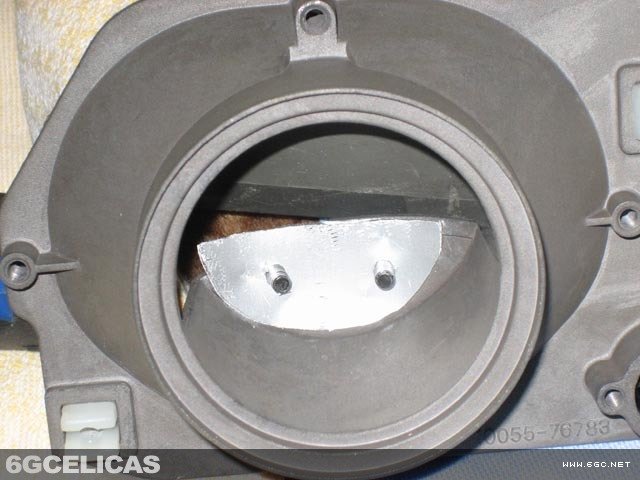 Open projector showing internal cutoff shield requiring modification