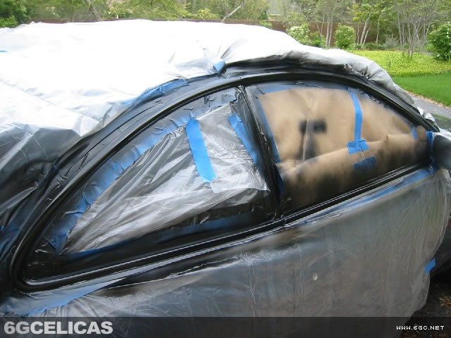 Paint application process showing proper spray technique on trim