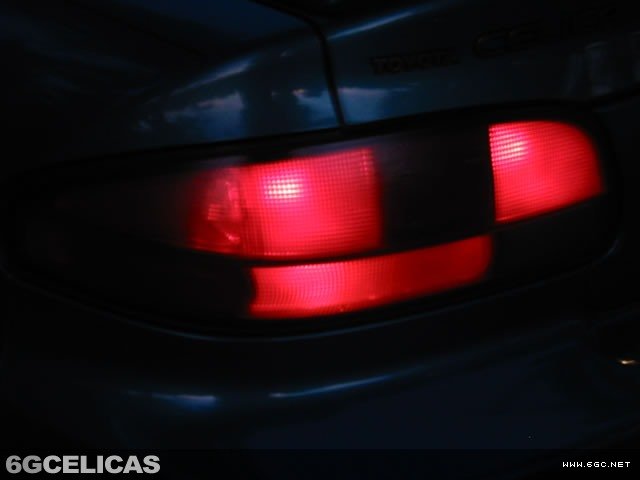 Painted tail light assembly showing red transparent finish