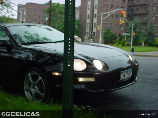 Applying adhesive to install clear plexiglass lens